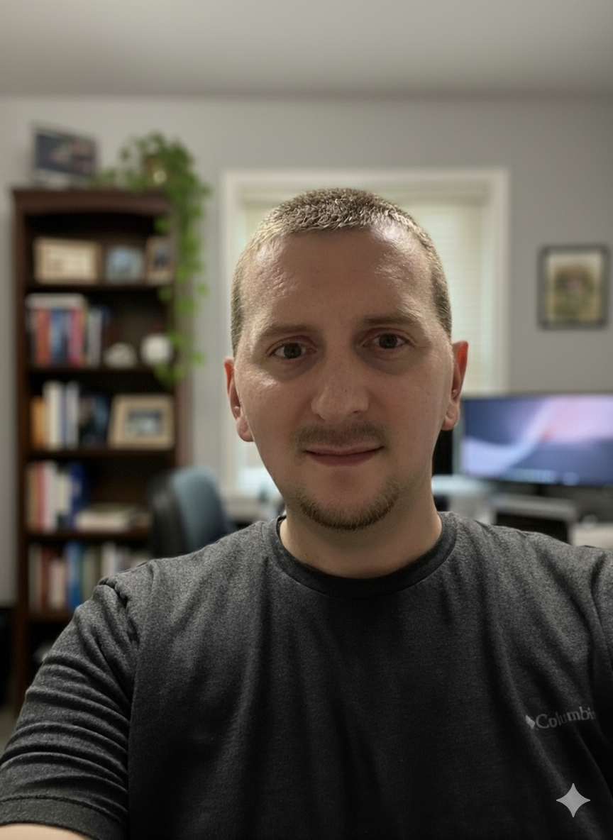 A professional headshot of Josh Strohm